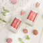 4711 Acqua Colonia Lychee & White Mint Flakons zwischen Lychees und Minzblättern