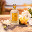 4711 Acqua Colonia Starfruit & White Flowers zwischen Sternfrüchten und weißen Blüten